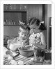 1960s two children boy girl bowl mixing pouring milk in kitchen by Anonymous
