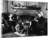 1930s family of four sitting in front fireplace mother knitting father reading smoking pipe kids doing homework by Anonymous