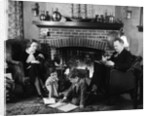 1930s family of four sitting in front fireplace mother knitting father reading smoking pipe kids doing homework by Anonymous