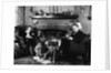 1930s family of four sitting in front fireplace mother knitting father reading smoking pipe kids doing homework by Anonymous