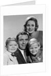 1960s family portrait father mother two sons smiling by Anonymous