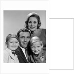 1960s family portrait father mother two sons smiling by Anonymous