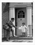 1920s smiling little girl receiving mail from postman by Anonymous