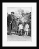 1920s group of three children watching organ grinder's monkey in costume standing on hind legs by Anonymous