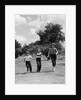 1950s three girls running in grassy field by Anonymous