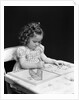 1960s 1940s girl child sitting at desk drawing coloring pictures by Anonymous