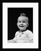 1940s smiling blond boy with big curl on top of head looking up by Anonymous