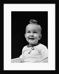 1940s smiling blond boy with big curl on top of head looking up by Anonymous