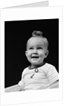 1940s smiling blond boy with big curl on top of head looking up by Anonymous