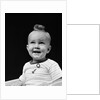 1940s smiling blond boy with big curl on top of head looking up by Anonymous