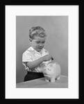 1950slittle boy putting coin into piggy bank by Anonymous