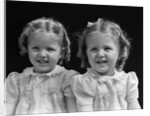 1930s portrait twin girls smiling by Anonymous