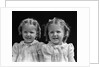 1930s portrait twin girls smiling by Anonymous