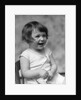 1930s smiling laughing toddler girl holding shoe by Anonymous