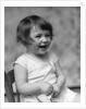 1930s smiling laughing toddler girl holding shoe by Anonymous