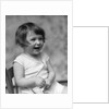 1930s smiling laughing toddler girl holding shoe by Anonymous