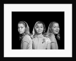 1950s 1960s multiple exposure girl going from happy to sad three facial expressions looking at camera by Anonymous