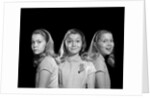 1950s 1960s multiple exposure girl going from happy to sad three facial expressions looking at camera by Anonymous