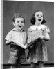 1930s two children standing singing by Anonymous