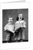1930s two children standing singing by Anonymous