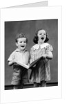 1930s two children standing singing by Anonymous