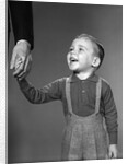 1960s boy holding adult male hand smiling by Anonymous