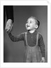 1960s boy holding adult male hand smiling by Anonymous
