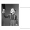 1960s boy holding adult male hand smiling by Anonymous