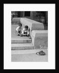 1930s two boys playing trick with string tied to lost purse by Anonymous