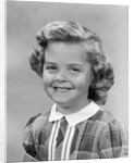 1950s portrait smiling girl with white collar plaid dress looking at camera by Anonymous