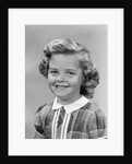 1950s portrait smiling girl with white collar plaid dress looking at camera by Anonymous