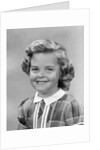1950s portrait smiling girl with white collar plaid dress looking at camera by Anonymous