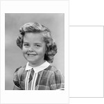 1950s portrait smiling girl with white collar plaid dress looking at camera by Anonymous