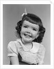 1950s smiling brunette girl with bangs by Anonymous