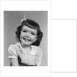 1950s smiling brunette girl with bangs by Anonymous