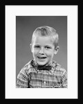 1950s smiling blond boy wearing plaid shirt bow ties looking at camera by Anonymous