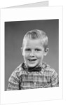 1950s smiling blond boy wearing plaid shirt bow ties looking at camera by Anonymous