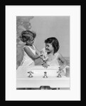 1930s two girls sisters at bathroom sink by Anonymous
