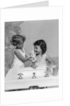 1930s two girls sisters at bathroom sink by Anonymous