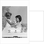 1930s two girls sisters at bathroom sink by Anonymous