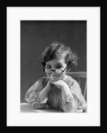 1930s portrait little girl smiling wearing big round eyeglasses looking at camera by Anonymous