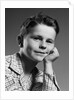 1950s child portrait boy with freckles posed resting head cheek on hand by Anonymous