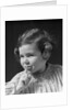 1930s little girl with finger to lips making quiet gesture looking at camera by Anonymous