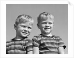 1950s portrait two twin blond boys smiling wearing striped tee shirts brothers by Corbis