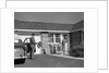 1950s family greeting father in driveway by Anonymous