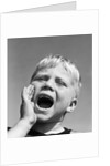 1950s blond boy with eyes closed and hand cupping a wide open mouth shouting by Anonymous