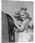 1930s 1940s child blond little girl with pigtails putting letter into mail box, looking at camera by Anonymous