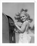1930s 1940s child blond little girl with pigtails putting letter into mail box, looking at camera by Anonymous
