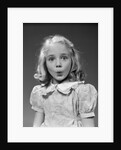1940s 1950s blond girl whistling lips puckered eyes wide open looking at camera by Anonymous