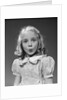1940s 1950s blond girl whistling lips puckered eyes wide open looking at camera by Anonymous
